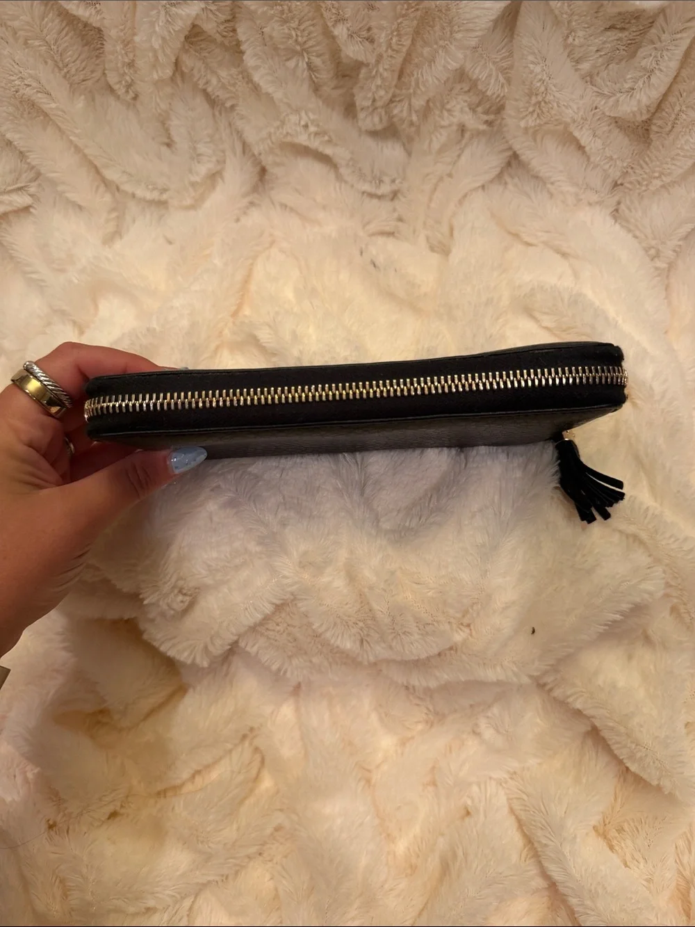 Gucci Black Embossed GG Zip Wallet with Tassel